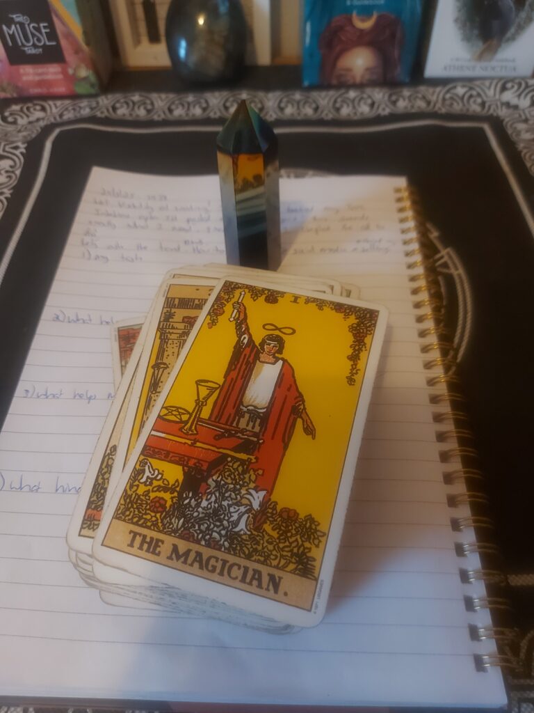 psychic reading central scotland, Magician tarot card, journal, and crystal point